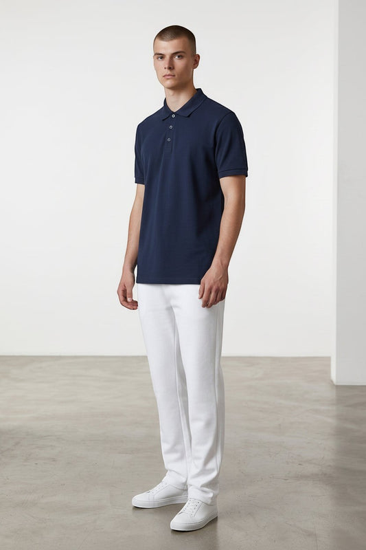 Home Kind navy blue 100% cotton polo shirt with a structured collar and cuff, 220 GSM Airtex textured finish.