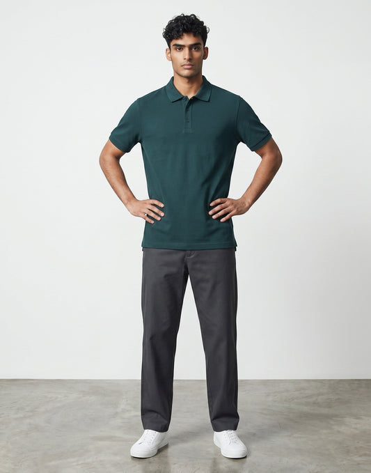Home Kind petrol blue 100% cotton polo shirt with textured finish, regular fit, and structured collar.