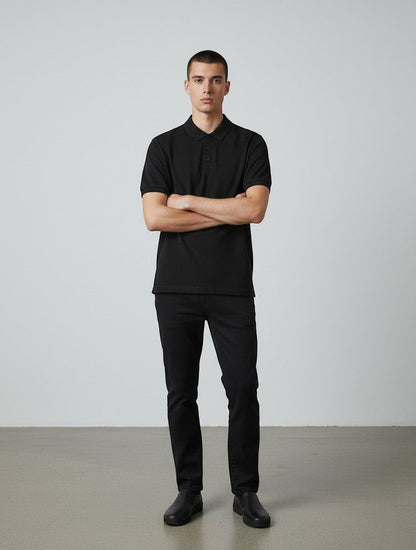 Home Kind black 100% cotton polo shirt with a textured finish, structured collar, and button placket.