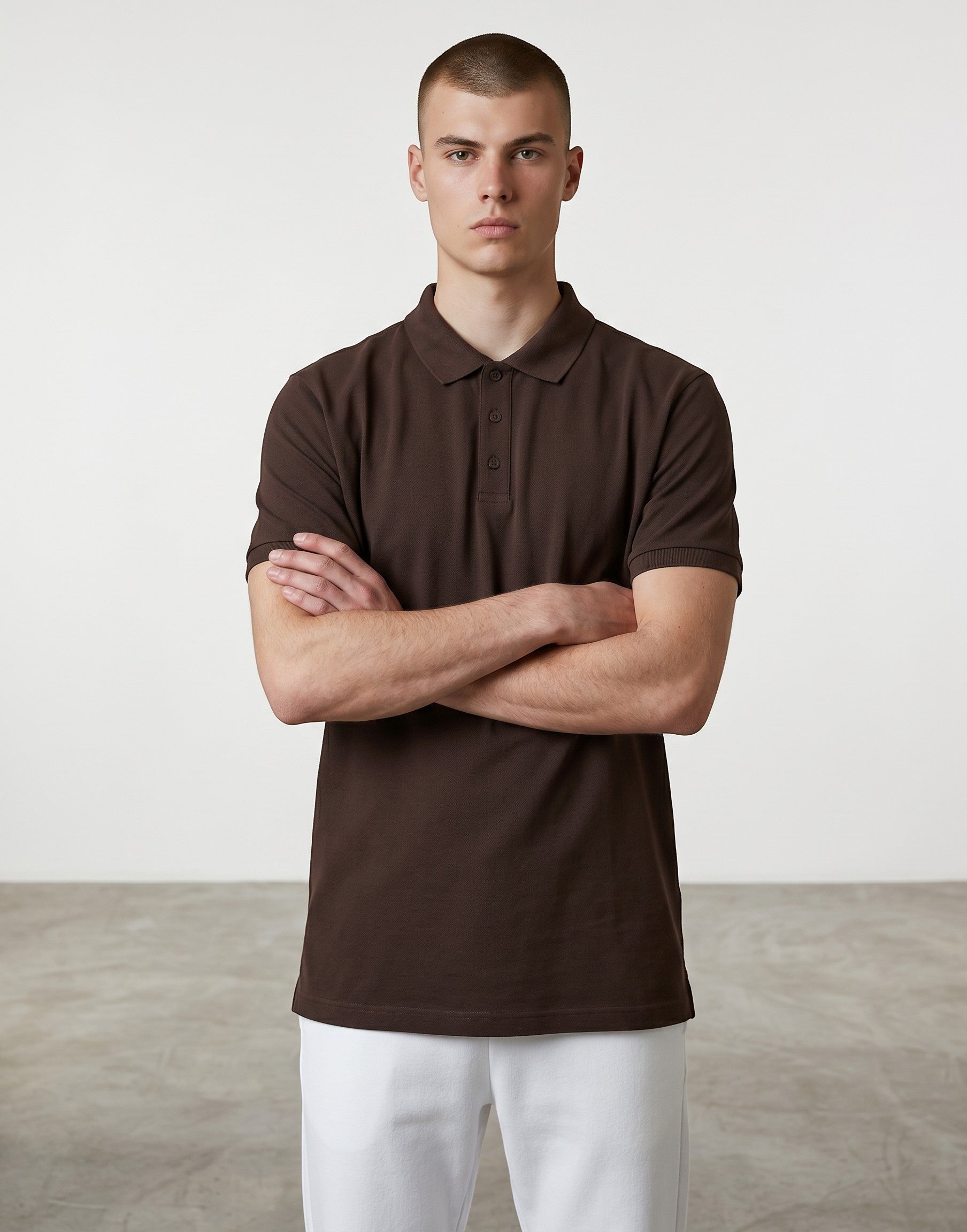 Home Kind coffee brown 100% cotton polo shirt with a structured collar and cuff, 220 GSM Airtex textured finish.