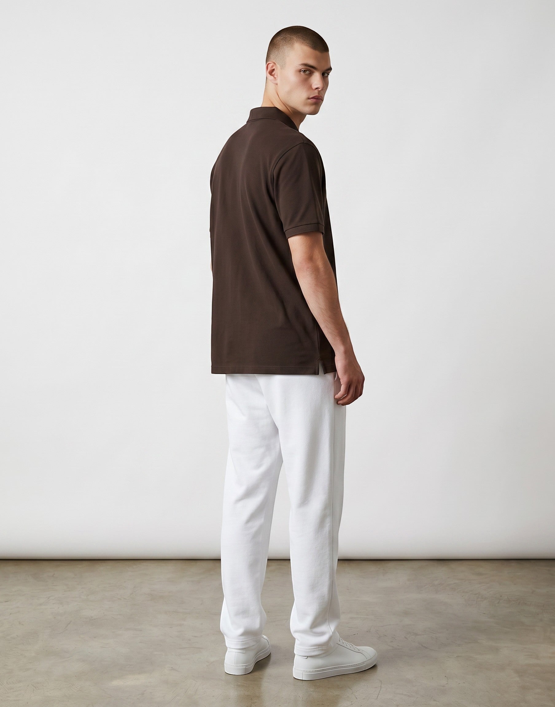 Home Kind coffee brown 100% cotton polo shirt with a structured collar and cuff, featuring a textured finish.