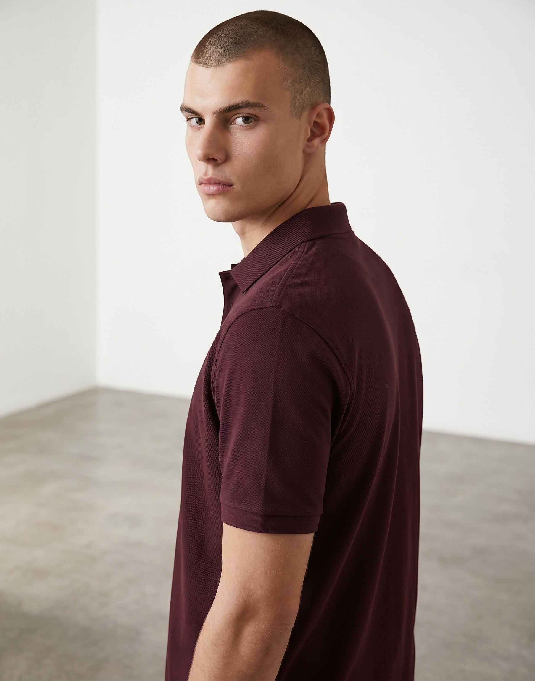 Home Kind maroon 100% cotton polo shirt with a structured collar and button placket. Textured finish.