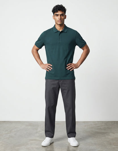 Home Kind petrol blue 100% cotton polo shirt with textured finish, regular fit, and structured collar.