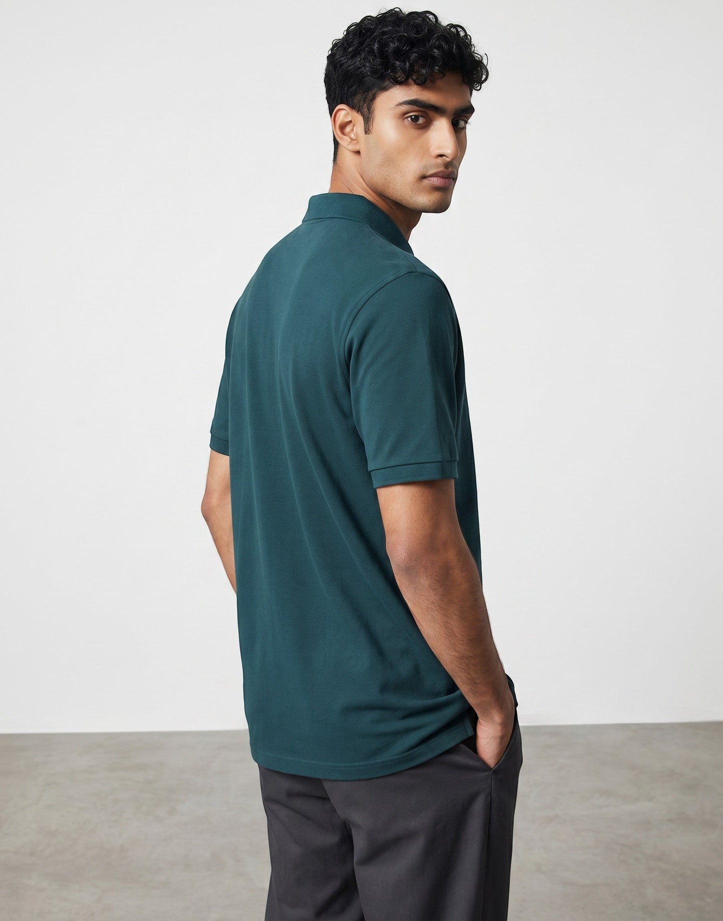 Home Kind petrol blue 100% cotton polo shirt with textured finish, regular fit, and structured collar.