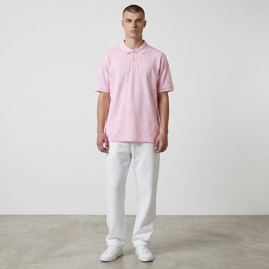 Home Kind light pink short-sleeve unisex polo t-shirt made from 100% combed cotton with a 230 GSM bio-washed fabric and side seam slit.