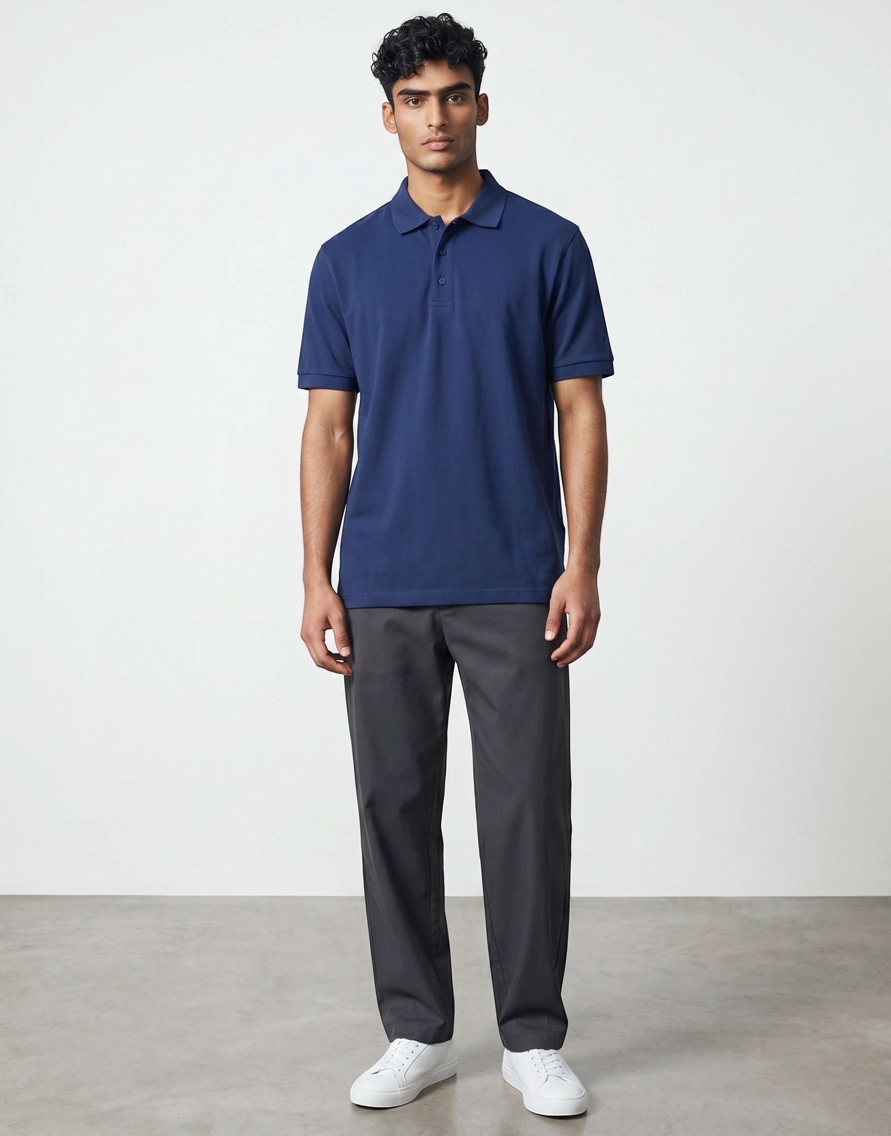 Home Kind royal blue 100% cotton polo shirt with a textured finish, regular fit, and structured collar.