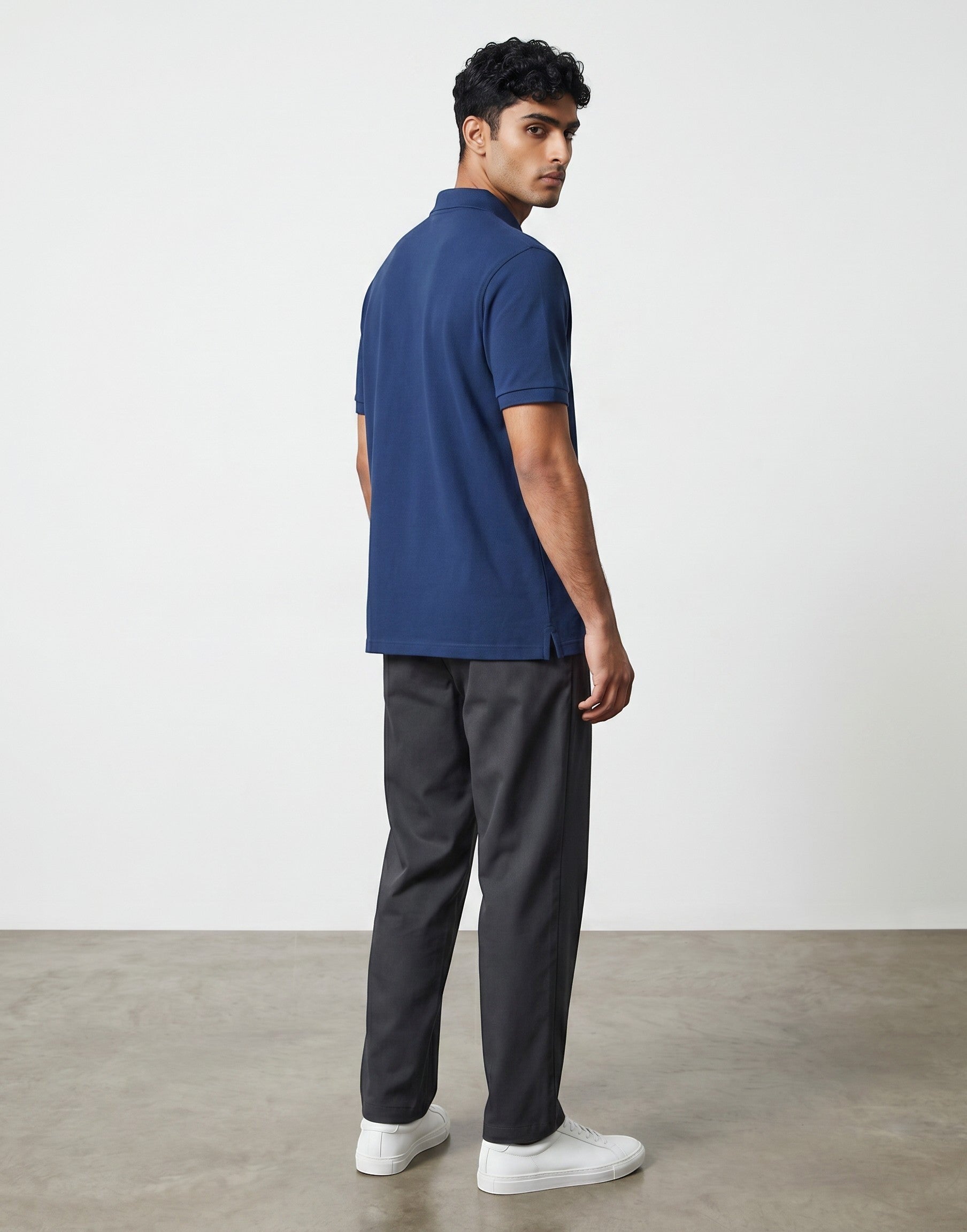 Home Kind royal blue 100% cotton polo shirt with textured finish, regular fit, and structured collar.