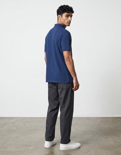 Home Kind royal blue 100% cotton polo shirt with textured finish, regular fit, and structured collar.